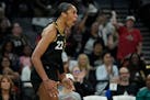 Las Vegas Aces forward A’ja Wilson (22) celebrates after a play against the Dallas Wings during the first half in Game 2 .