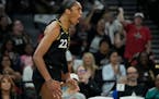 Las Vegas Aces forward A’ja Wilson (22) celebrates after a play against the Dallas Wings during the first half in Game 2 .