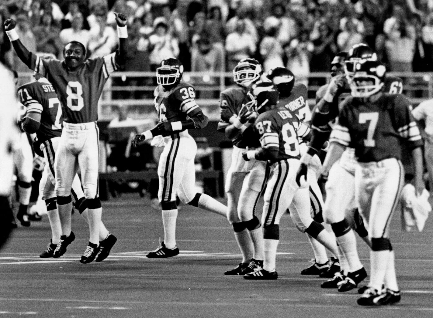 Greg Coleman (8) led the Vikings celebration after Ahmad Rashad had grabbed a 22-yard touchdown pass from Tommy Kramer in 1982