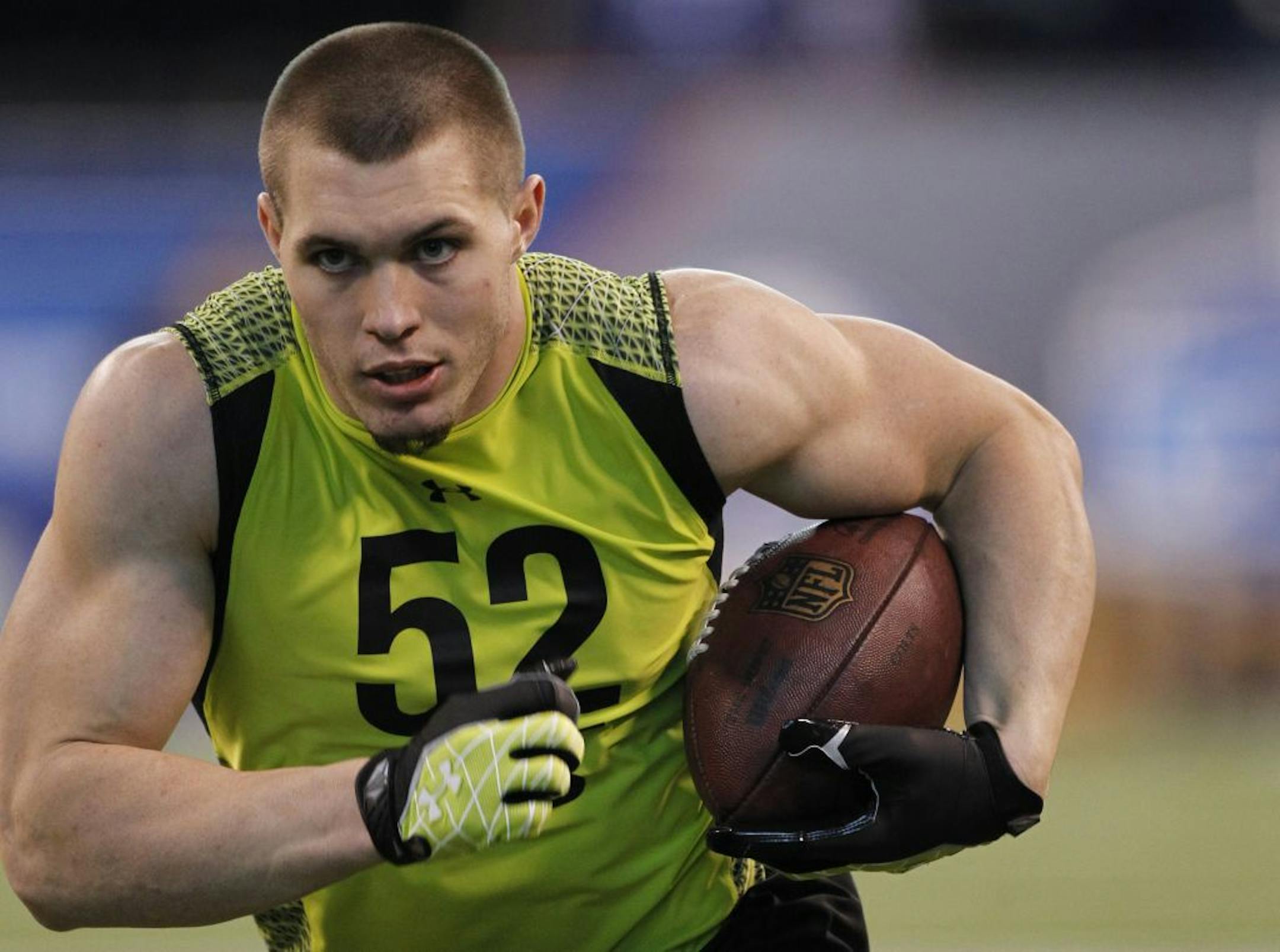Notre Dame defensive back Harrison Smith runs a drill at the NFL football scouting combine in Indianapolis on Tuesday, Feb. 28, 2012.