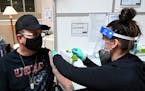 James Allison, 49, an eight year veteran with the United States Marine Corp., received a dose of the Pfizer-BioNTech COVID-19 vaccine Tuesday at the M