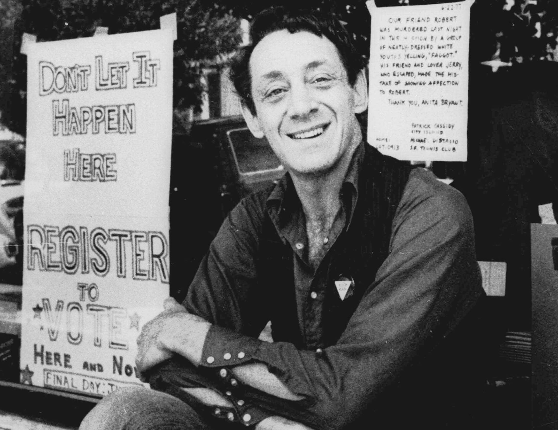 Harvey Milk poses in front of his camera shop in San Francisco in this Nov. 9, 1977 photo. Nov. 27, 1998 marks the 20th anniversary of the assassination of San Francisco Supervisor Harvey Milk and Mayor George Moscone. (AP photo) ORG XMIT: FX5