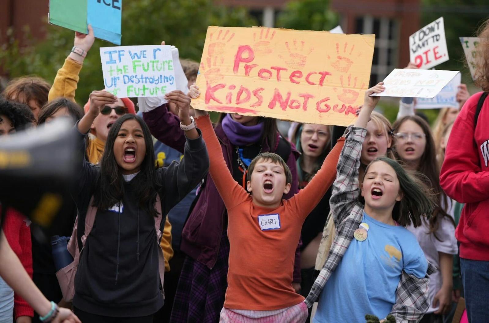 Students gather at Lynnhurst Park in Minneapolis Friday in protest of gun violence as part of a nationwide walkout.