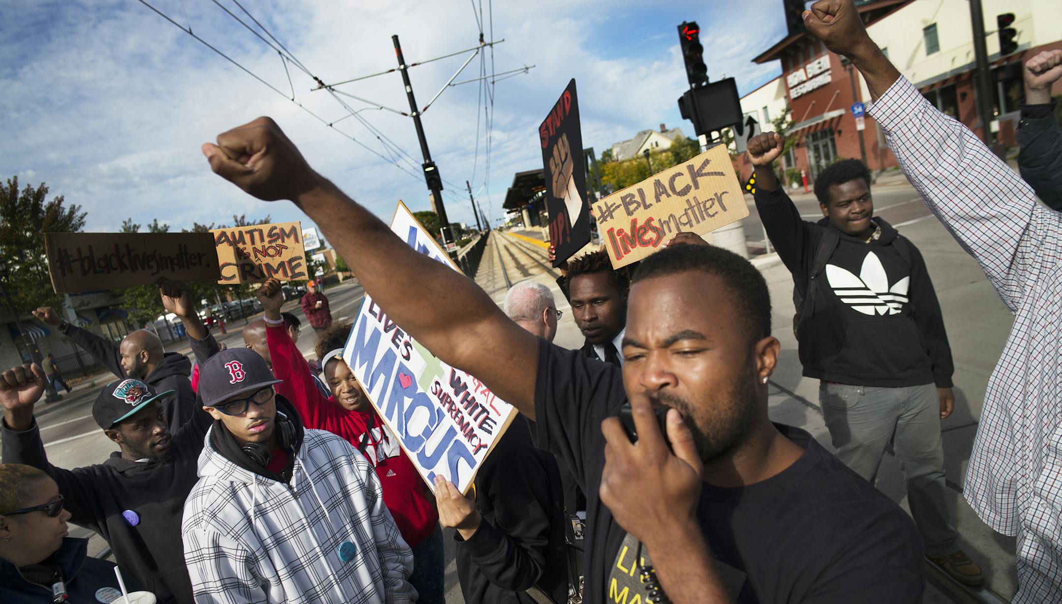 Near the Lexington light rail station in St. Paul, protesters with Black Lives Matters blocked traffic to and from TCF Stadium on the home opener for the Vikings. Organizer Rashad Turner, front, led the event.]Richard Tsong-Taatarii/rtsong-taatarii@startribune.com ORG XMIT: MIN1509201226290783