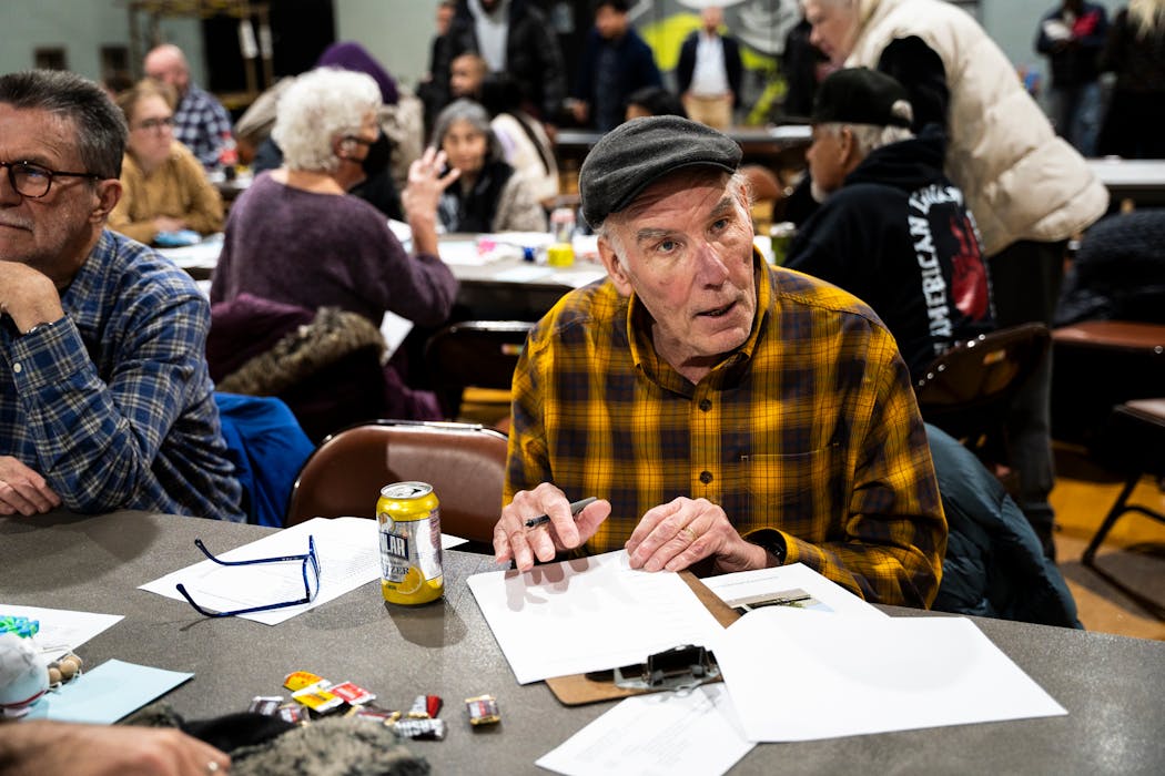 Kevin Barnes brainstorms with his tablemates about community safety ideas for Lake Street and south Minneapolis at a community engagement meeting at Powderhorn Recreation Center in March.