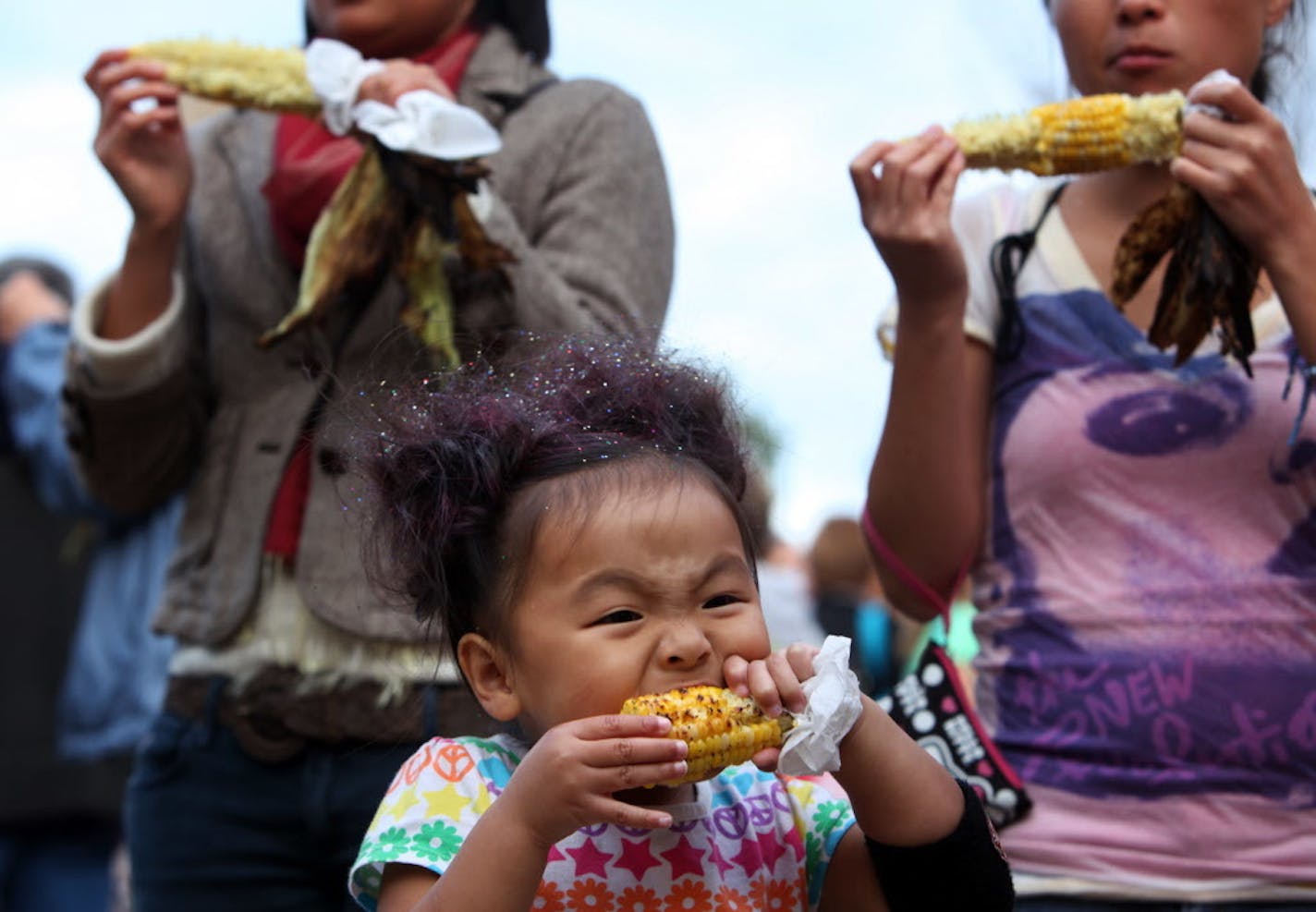 Three-year-old Bennie Lee of St. Paul worked hard at eating a cob of corn while at the Minnesota State Fair in this 2011 file photo.