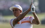 Rickie Fowler hits on the 12th hole during the first round of the U.S. Open golf tournament Thursday, June 15, 2017, at Erin Hills in Erin, Wis. (AP P