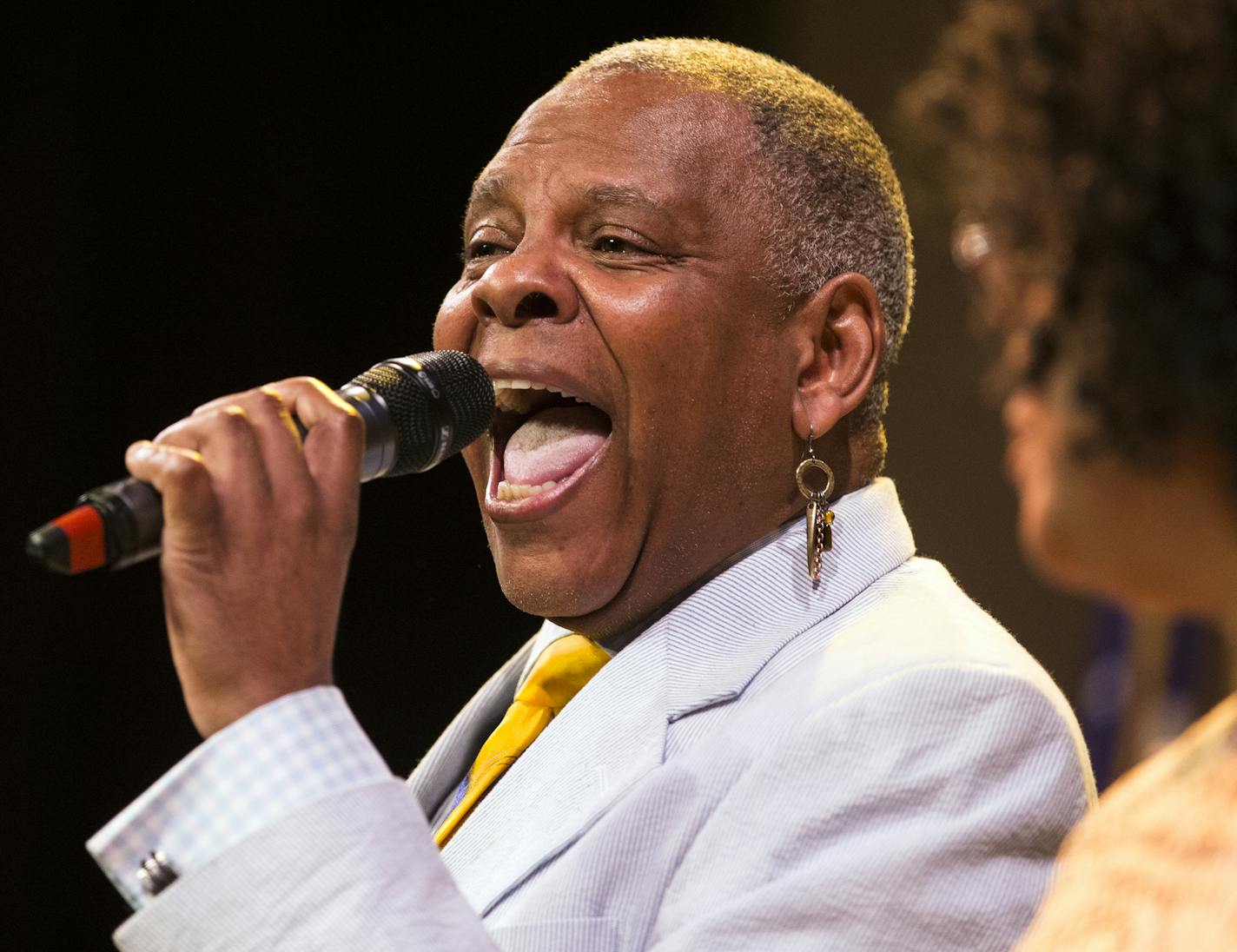 Dennis Spears, a member of the Penumbra Theatre Company performs the song "Takin' It To The Streets" by the Doobie Brothers after the State of the City address. ] (Leila Navidi/Star Tribune) leila.navidi@startribune.com BACKGROUND INFORMATION: St. Paul Mayor gives his 2016 State of the City address Tuesday, April 19, 2016 at the Penumbra Theatre in St. Paul. Interspersed in the speech were performances of excerpts of August Wilson plays.