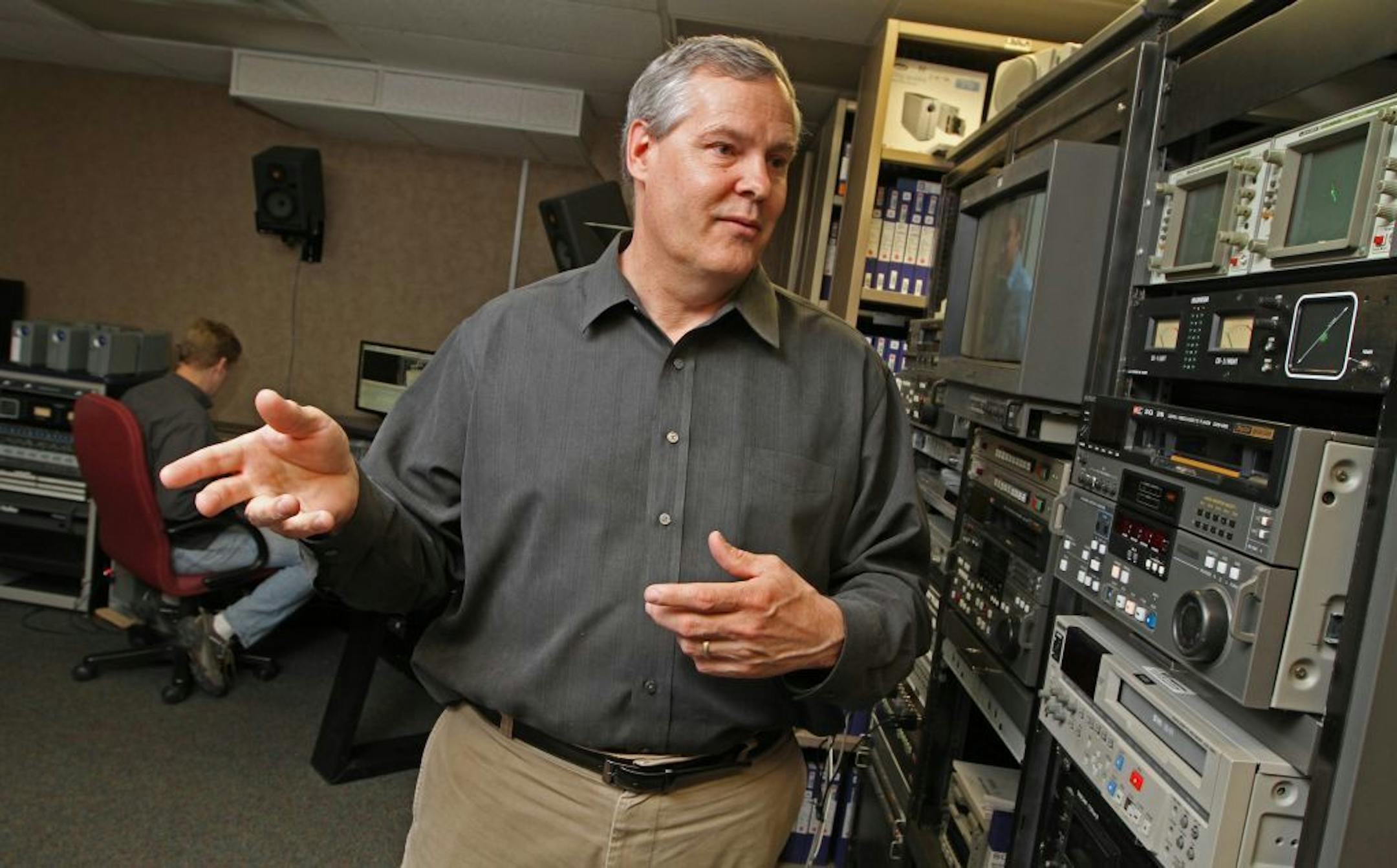 As he stood in the asset preperation room, Douglas Olzenak, President of Allied Vaughn explained how the movie studios are using manufacturing on demand (MOD) to profit from their deep catalogs of movies from their archives, giving consumers access to films and television shows. Allied Vaughn is an Edina media service company that has accounts with major film companies in which they offer a on-demand production service of classic films and episodic television series. Photographed on 5/1/13 at th