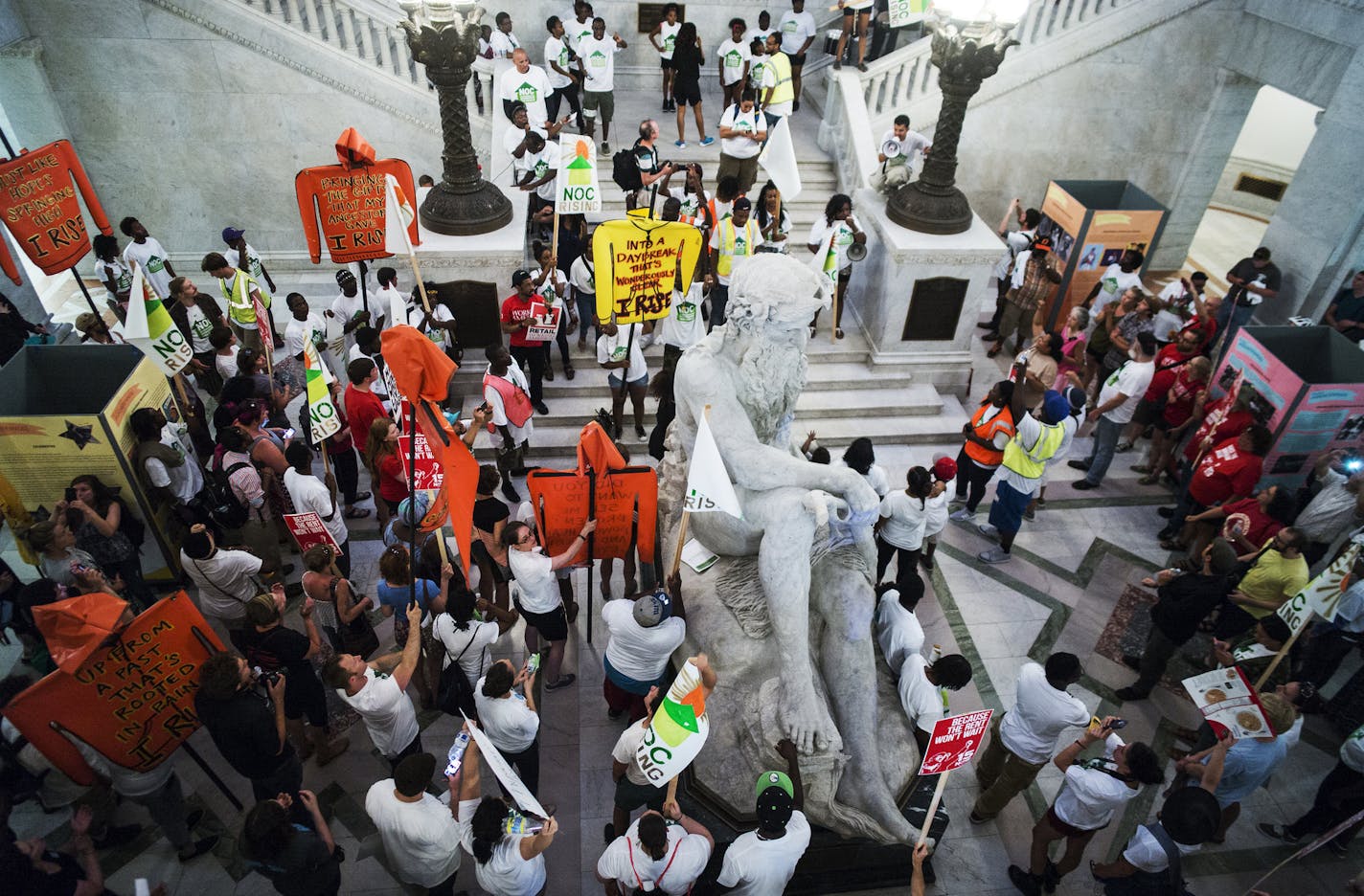 At the Minneapolis City Hall, members of NOC(Neighborhoods Organizing for Change) announced the results of a survey of North Minneapolis workers and demanded a $15 living wage minimum.] Richard Tsong-Taatarii/rtsong-taatarii@startribune.com