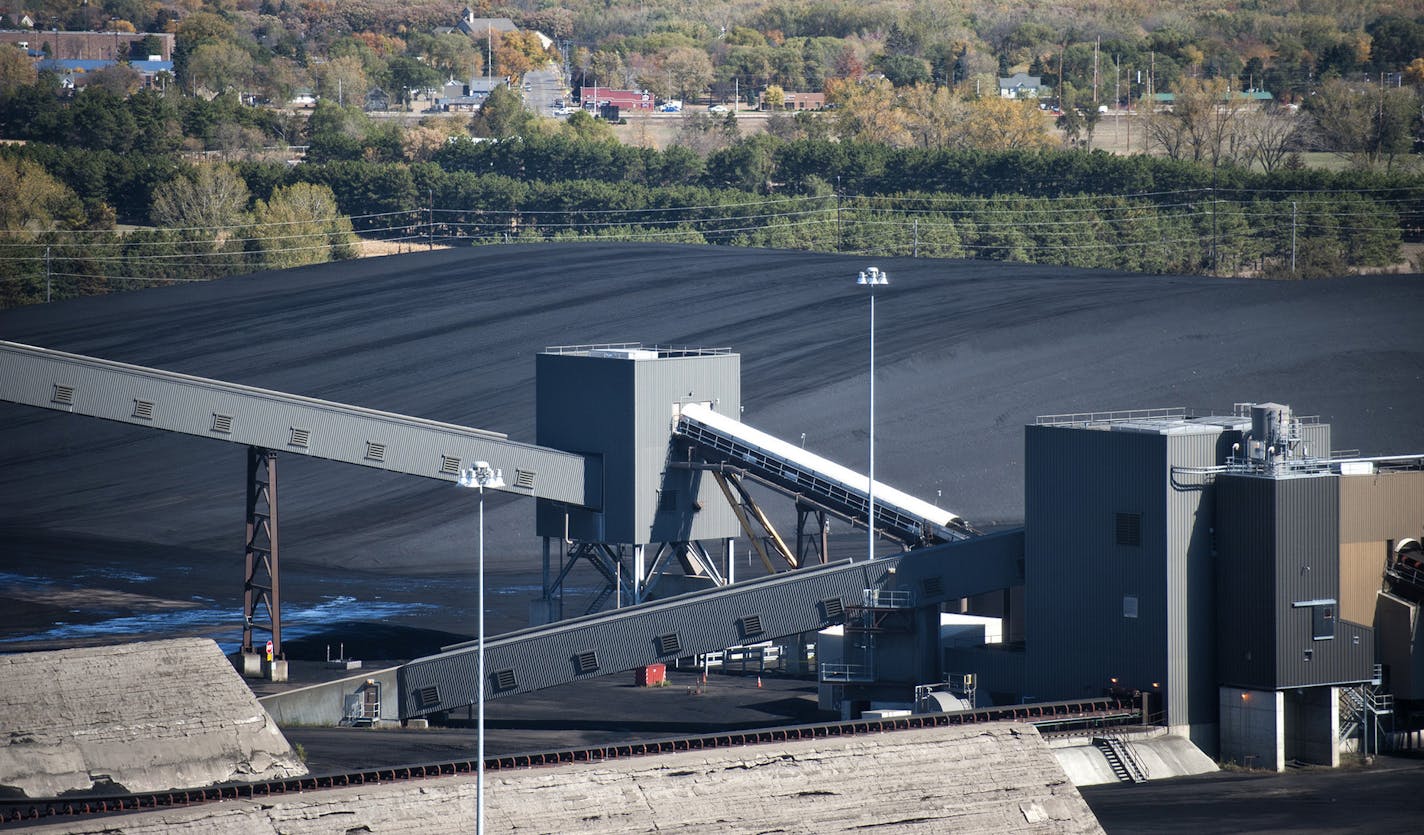 Stockpiled coal at Sherco. Excel Energy had an open house at the Sherburne County Generating Plant (Sherco) in Becker, Minnesota, Tuesday, October 2, 2012 Last November Unit 3 of the coal-fired plant had a catastrophic failure taking the plant offline. ] GLEN STUBBE * gstubbe@startribune.com ORG XMIT: MIN1210021458560059