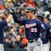 Minnesota Twins' Max Kepler (26) celebrates his three-run home against the Detroit Tigers with Robbie Grossman (36) in the fifth inning of a baseball 