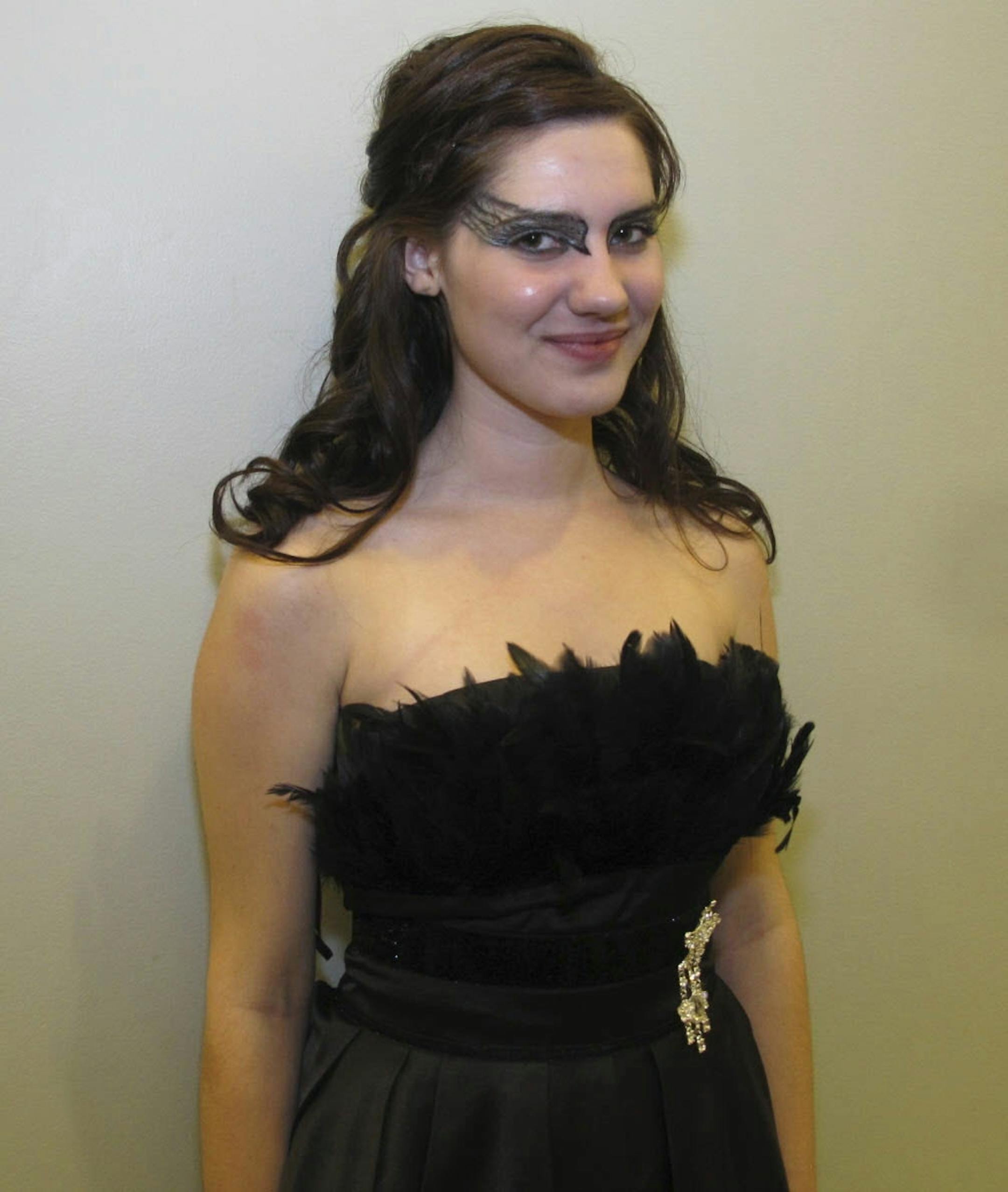 Sara Glassman, sglassman@startribune.com Coon Rapids High School's prom. Black Swan Megan Bender, senior Dress: $128 from uniquevintage.com Why: �I was so inspired by the movie�s mysteriousness and the darkness and yet the elegance.� Makeup: It took her three hours to do it herself.