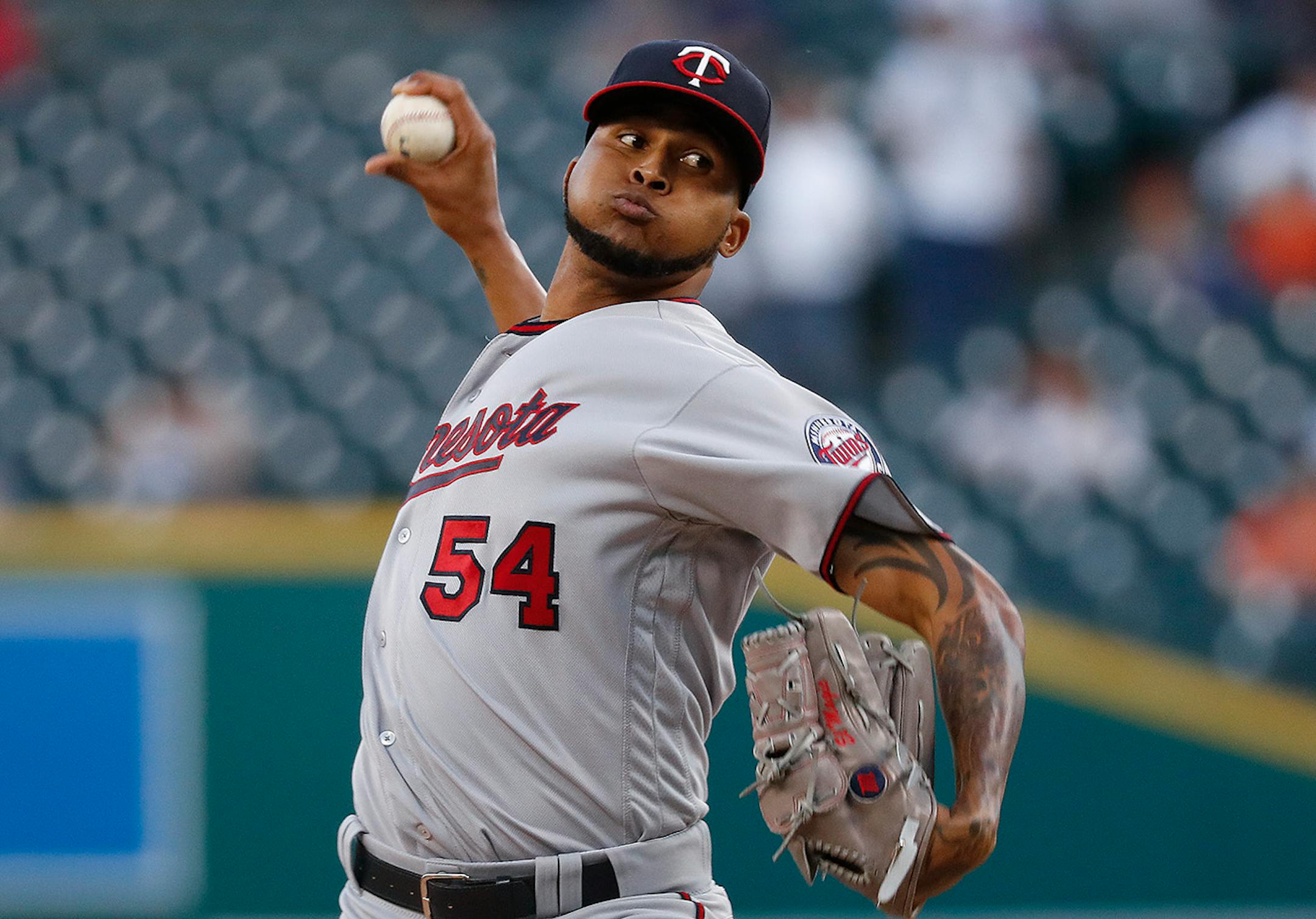 Minnesota Twins pitcher Ervin Santana throws against the Detroit Tigers in the first inning of a baseball game in Detroit, Monday, Sept. 12, 2016.