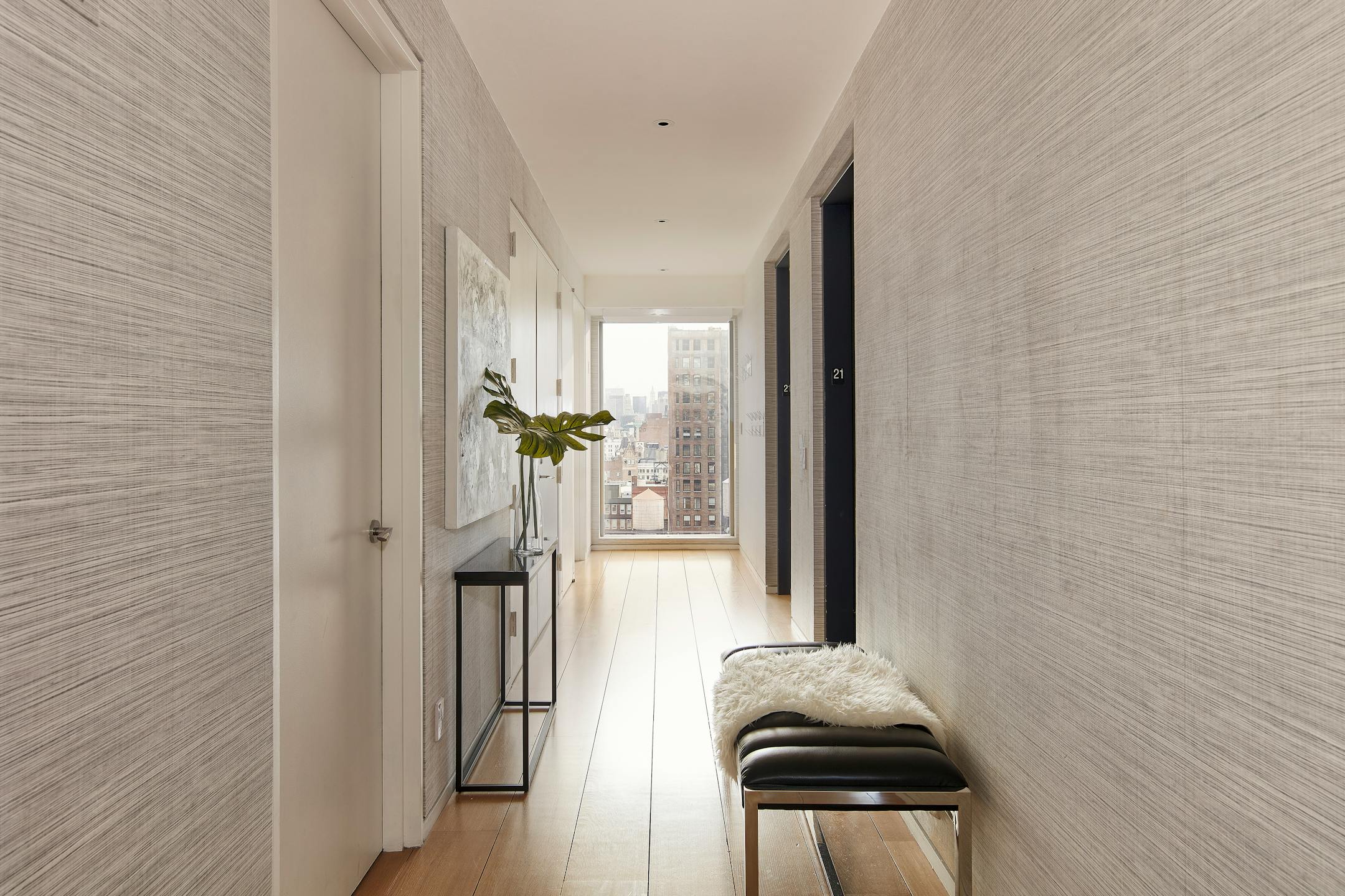 A long hallway is lined with wallpaper to add texture and interest. (Scott Gabriel Morris/TNS)
