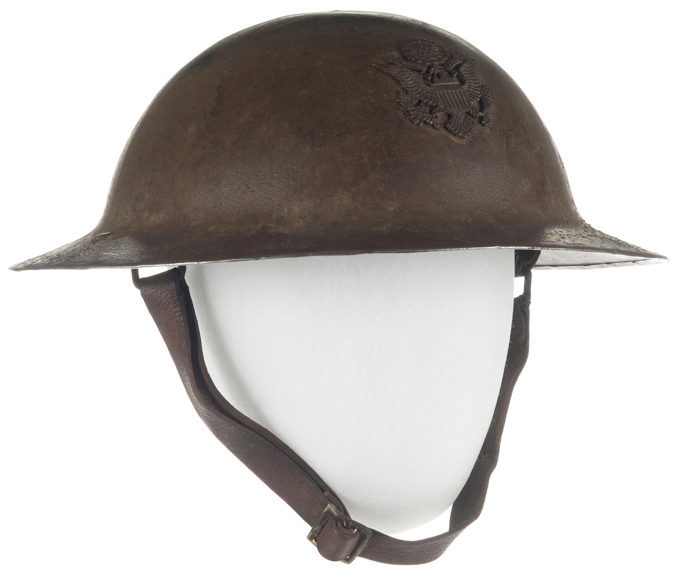 Minnesota Historical Society "Doughboy" helmet worn by Norman F. Claussen and portrait, St. Paul, about 1916-1918 Claussen was a first lieutenant with the 15th Field Artillery in the National Guard and served in the Mexican Border conflict in 1916. In 1917, he served with the American Expeditionary Forces in France. He received the Silver Star for &#xec;gallantry in action&#xee; and for &#xec;brilliant leadership&#xee; during his tour. In October 1918, shortly after returning to the United State