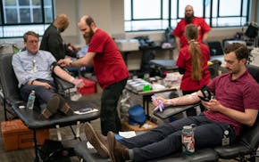 People donate blood in Minneapolis in March 2020.
