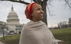 Rep. Ilhan Omar, a freshman Democrat representing Minnesota's 5th Congressional District, walks from her new office in the Longworth House Office Buil