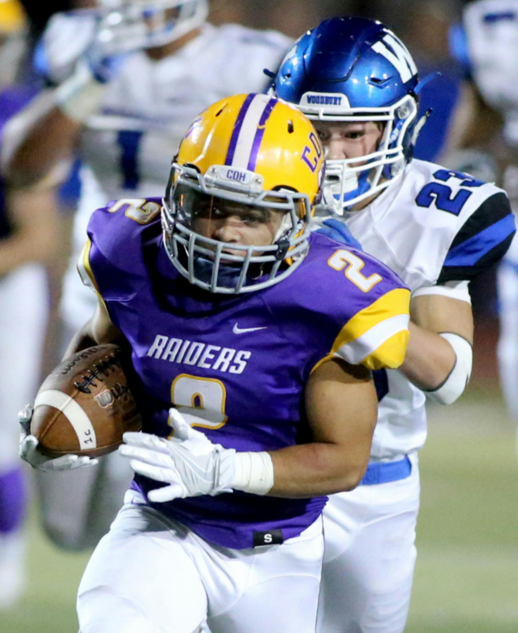 Cretin-Derham Hall runback Marquez Thompson (2) blows by Woodbury High defenders en route to a long fourth quarter touchdown run Friday, Sept. 9, 2016, at St. Thomas University in St. Paul, MN. Cretin-Derham Hall beat Woodbury 22-12.](DAVID JOLES/STARTRIBUNE)djoles@startribune.com Woodbury vs. Cretin-Derham Hall Friday, Sept. 9, 2016, at St. Thomas University in St. Paul, MN. ORG XMIT: MIN1609092217480269