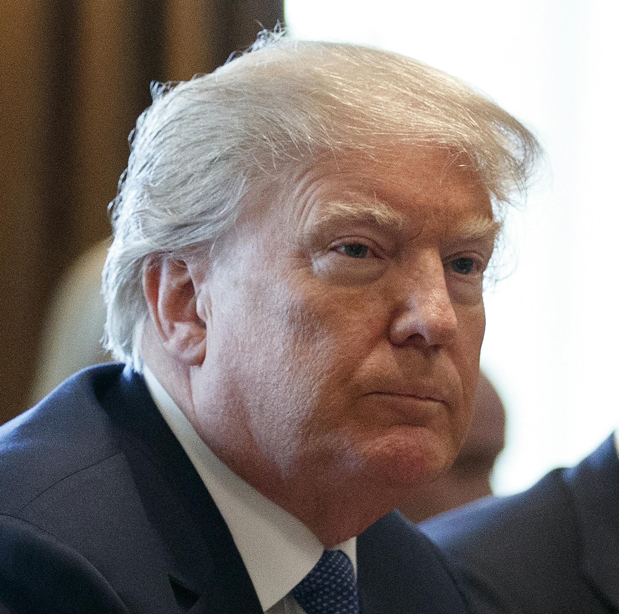 President Donald Trump speaks to reporters during a meeting with his Cabinet, in the Cabinet Room of the White House, in Washington, April 9, 2018. Trump on Monday denounced the suspected chemical weapons attack that killed dozens of people in Syria over the weekend as ìatrocious,î and said he will make a decision in the next 24 to 48 hours about whether to retaliate militarily as he did to a similar assault last year. (Tom Brenner/The New York Times)