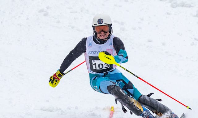 West Lutheran alpine skier Josh Nelson (103) passes through a gate in the second run of the MSHSL Boys and Girls Alpine Skiing State Meet Tuesday, Feb