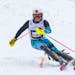 West Lutheran alpine skier Josh Nelson (103) passes through a gate in the second run of the MSHSL Boys and Girls Alpine Skiing State Meet Tuesday, Feb