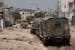 Israeli military vehicles are seen during a raid in the West Bank Jenin refugee camp, Tuesday, May 21, 2024. Israeli forces raided a militant strongho