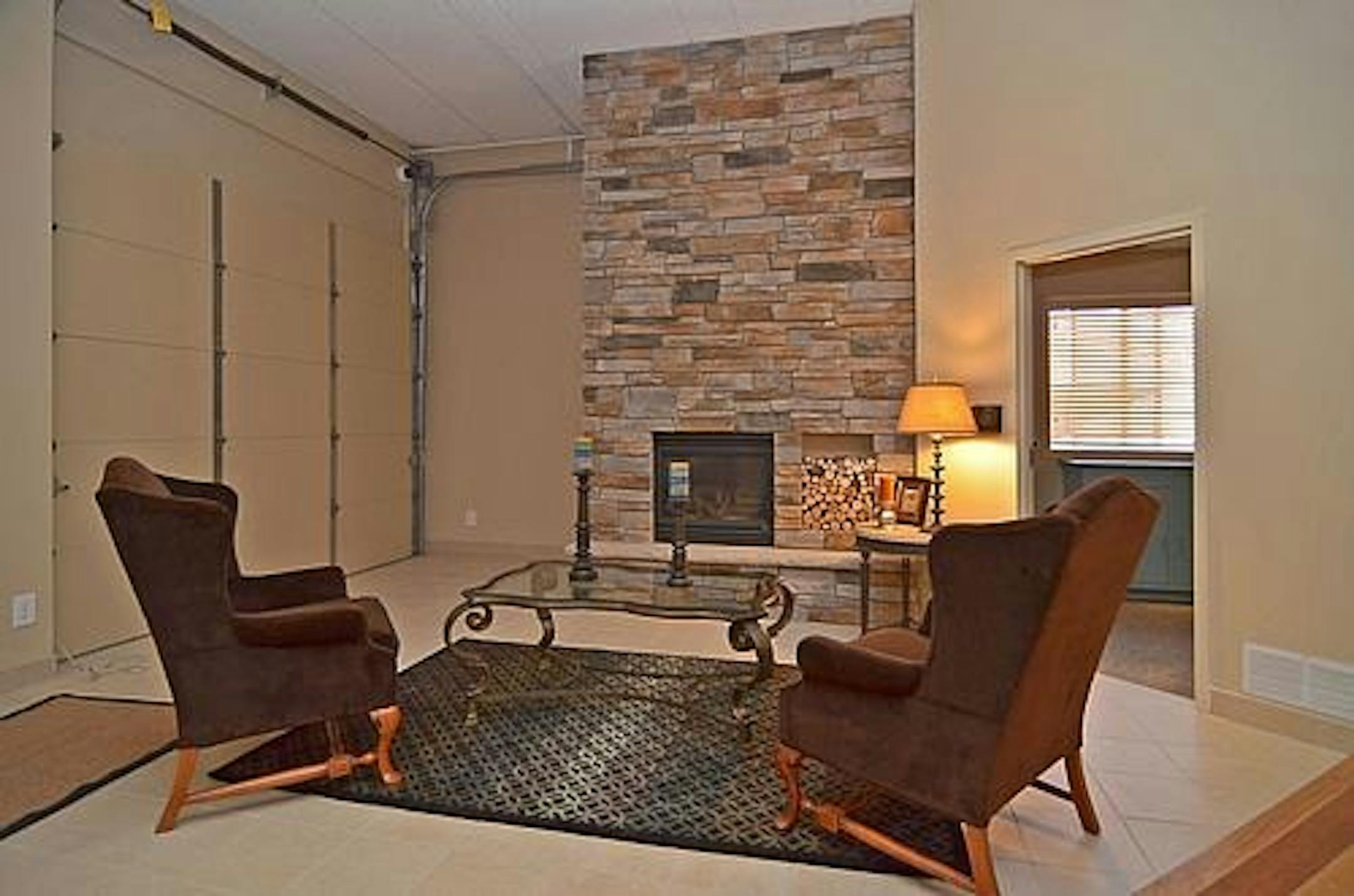 Yes, those are overhead garage doors in the living room.