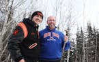 Armstrong High Nordic Ski coach Doug Hubred, right, was monitoring a tough turn on the sectional course when Ben Chong, a senior from St. Louis Park c