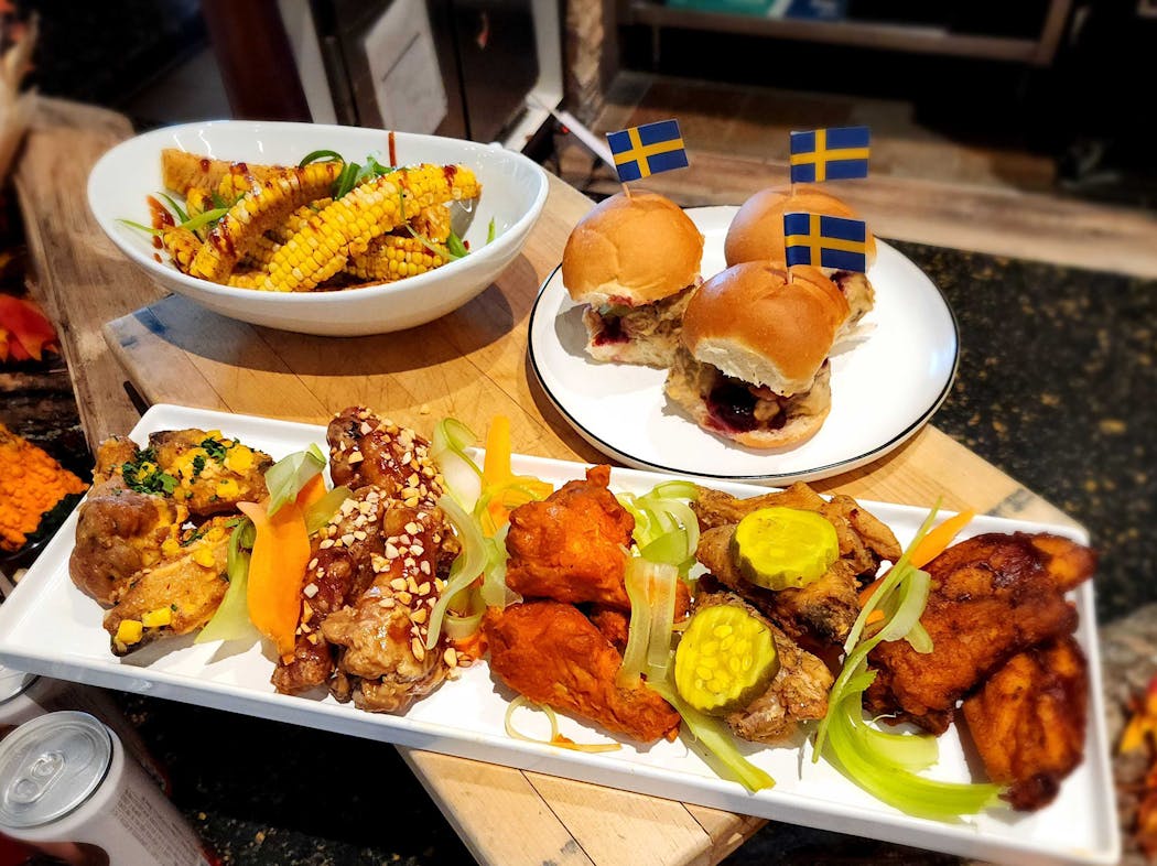 Corn ribs, Swedish meatball sliders and five flavors of bone-in wings are all new.