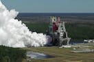 In an image broadcast by NASA, a live test of NASA's new Space Launch System, at the Stennis Space Center near Bay St. Louis, Miss., March 18, 2021. A