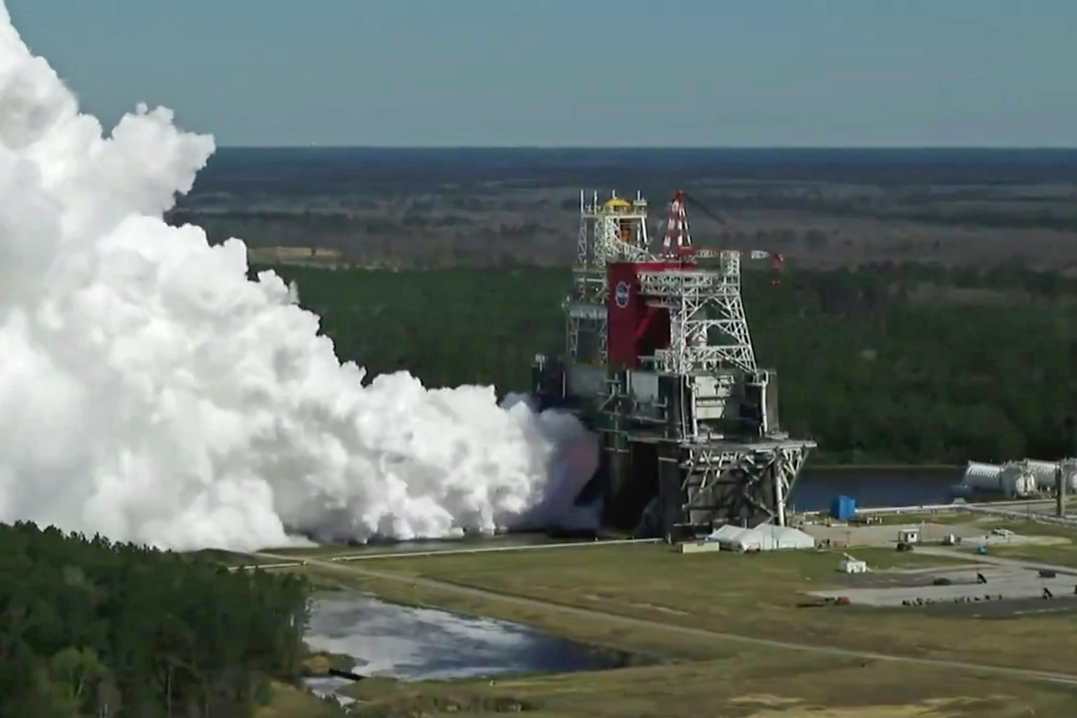 In an image broadcast by NASA, a live test of NASA's new Space Launch System, at the Stennis Space Center near Bay St. Louis, Miss., March 18, 2021. After multiple errors marred a test of the new engines in January, NASA fired them for more than 8 minutes on Thursday, as engineers had hoped.