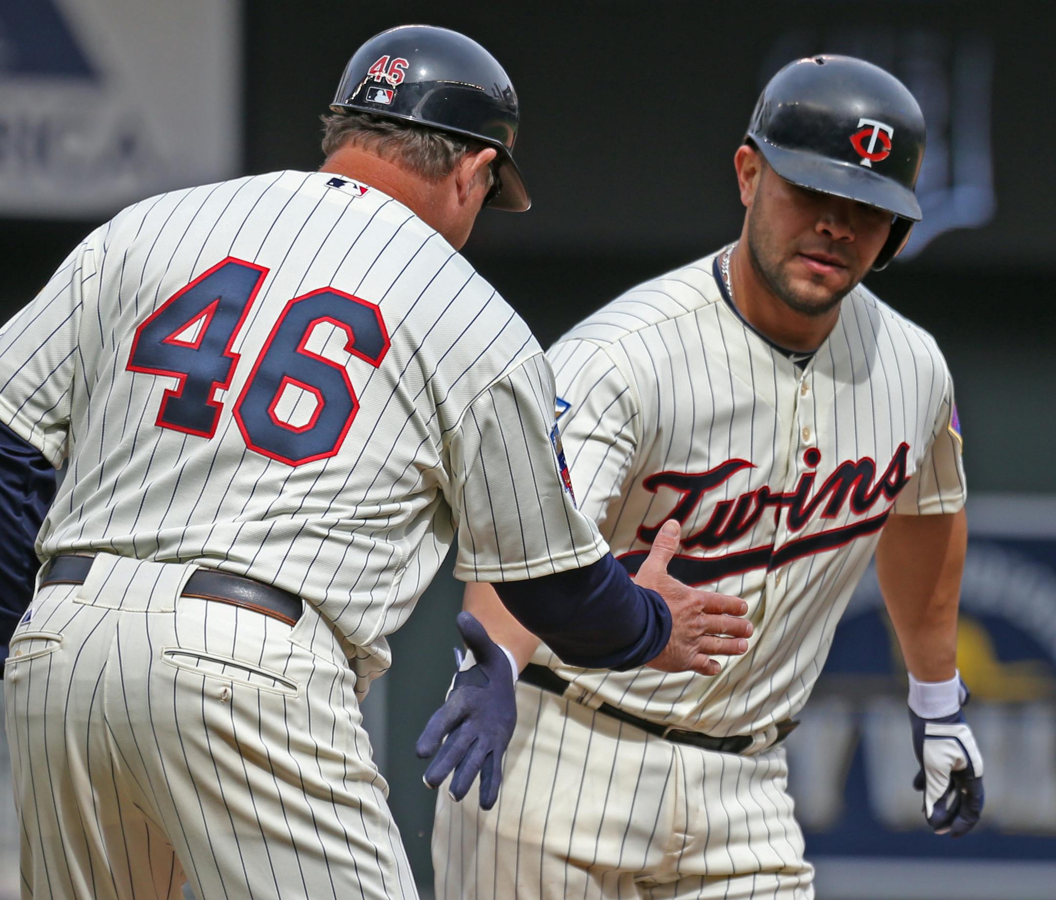 (right) Twins Josmil Pinto rounded the bases after hitting a home run in the 8th inning.] Minnesota vs. Detroit, Target Field, 4/26/14.] Bruce Bisping/Star Tribune bbisping@startribune.com Josmil Pinto/roster.