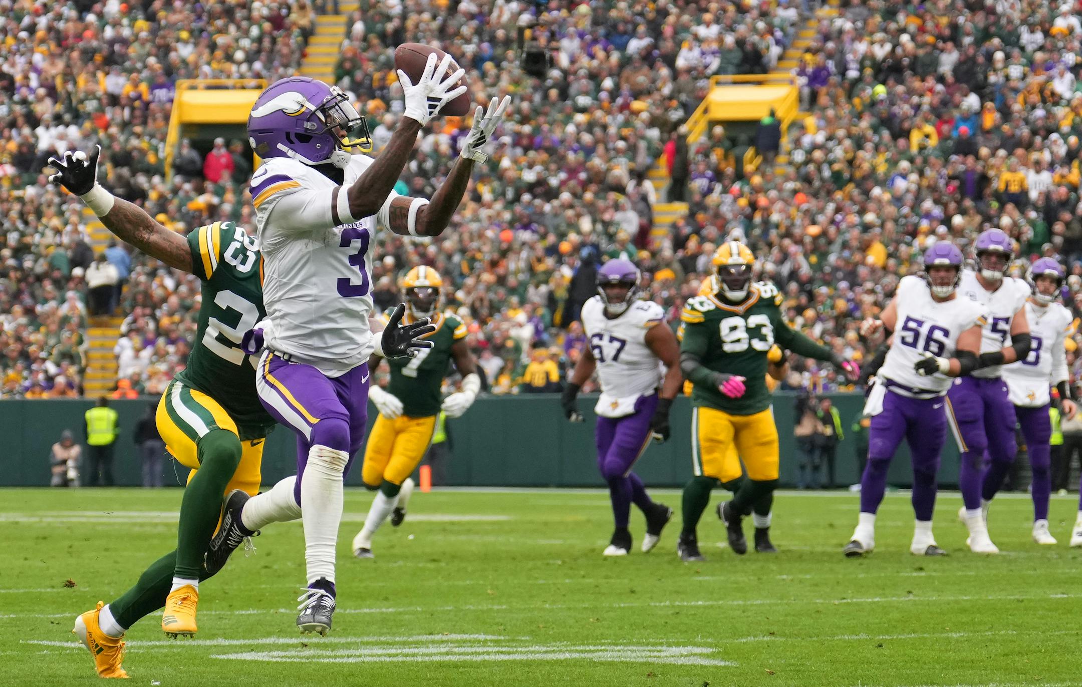Minnesota Vikings wide receiver Jordan Addison (3) catches a touchdown pass from Minnesota Vikings quarterback Kirk Cousins (8) in the third quarter of an NFL game between the Minnesota Vikings and the Green Bay Packers Sunday, Oct. 29, 2023 at Lambeau Field in Green Bay, Wis. ] ANTHONY SOUFFLE • anthony.souffle@startribune.com ORG XMIT: MIN2310291607030131