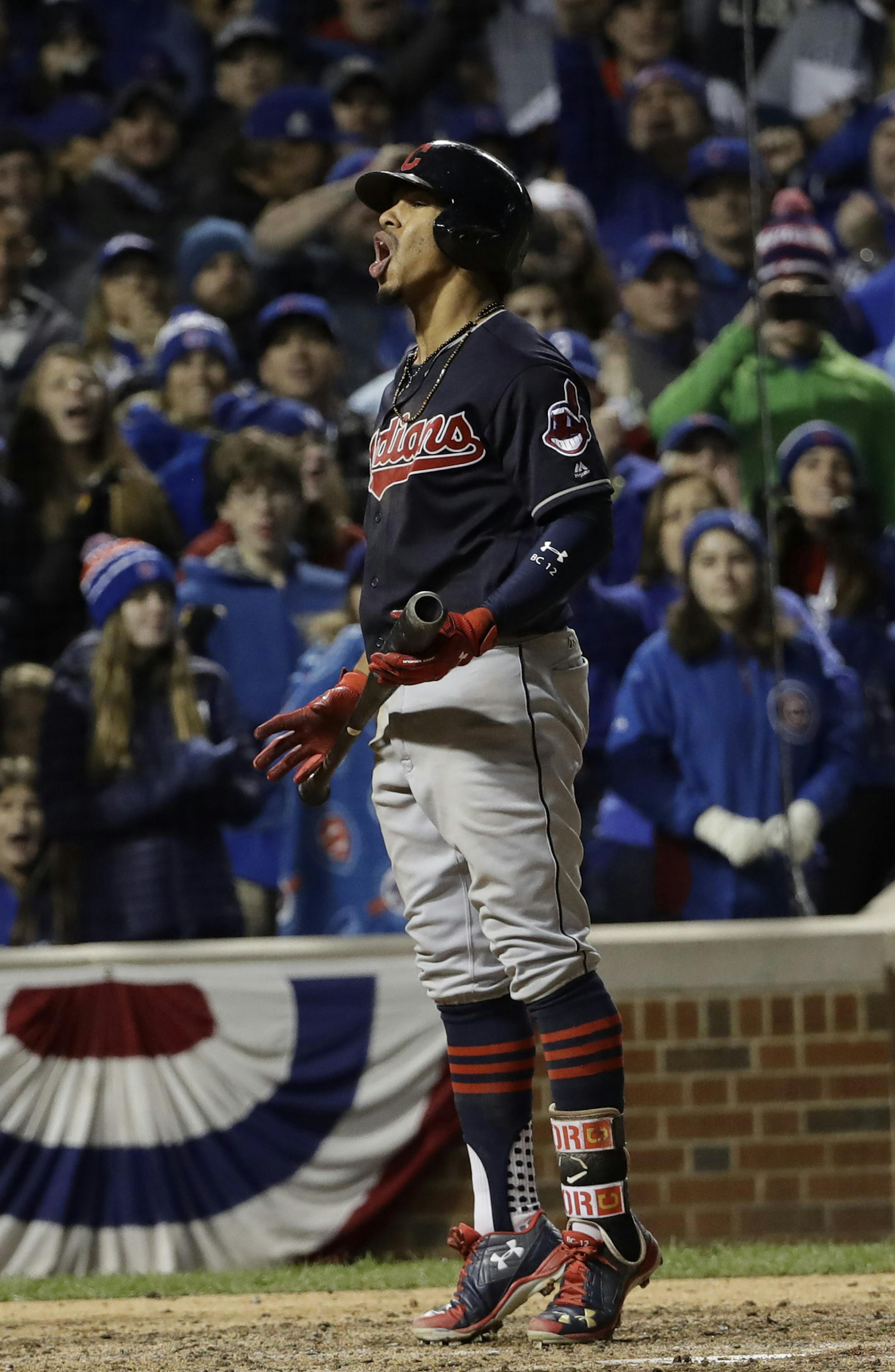 Cleveland Indians' Francisco Lindor reacts after striking out during the eighth inning of Game 5 of the Major League Baseball World Series against the Chicago Cubs Sunday, Oct. 30, 2016, in Chicago. (AP Photo/David J. Phillip)