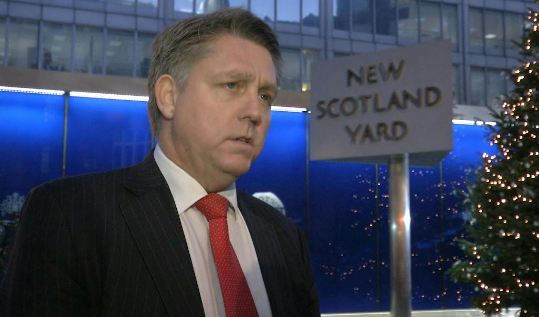 Kevin Hyland, head of the Metropolitan Police's human trafficking unit speaks to the media outside New Scotland Yard's London headquarters in this image taken from TV Thursday Nov. 21, 2013