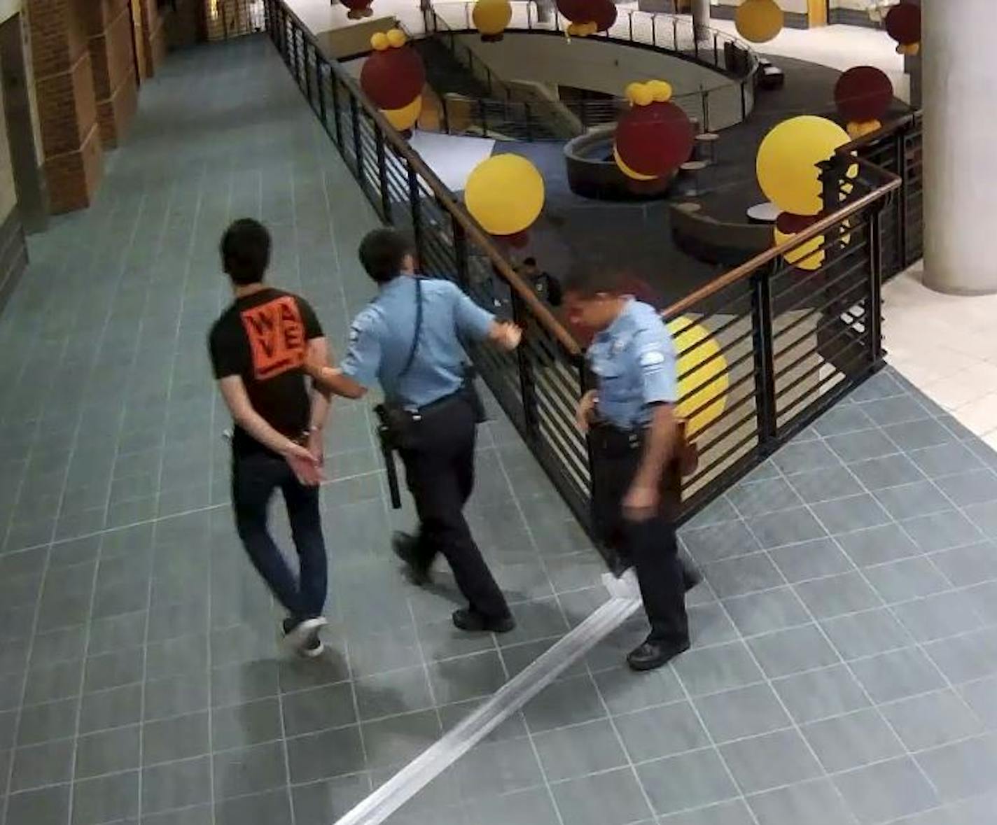 Surveillance footage from the Carlson School of Management shows Minneapolis police escorting a handcuffed Richard Liu out of the building following accusations of sexual asault. Liu was never charged.