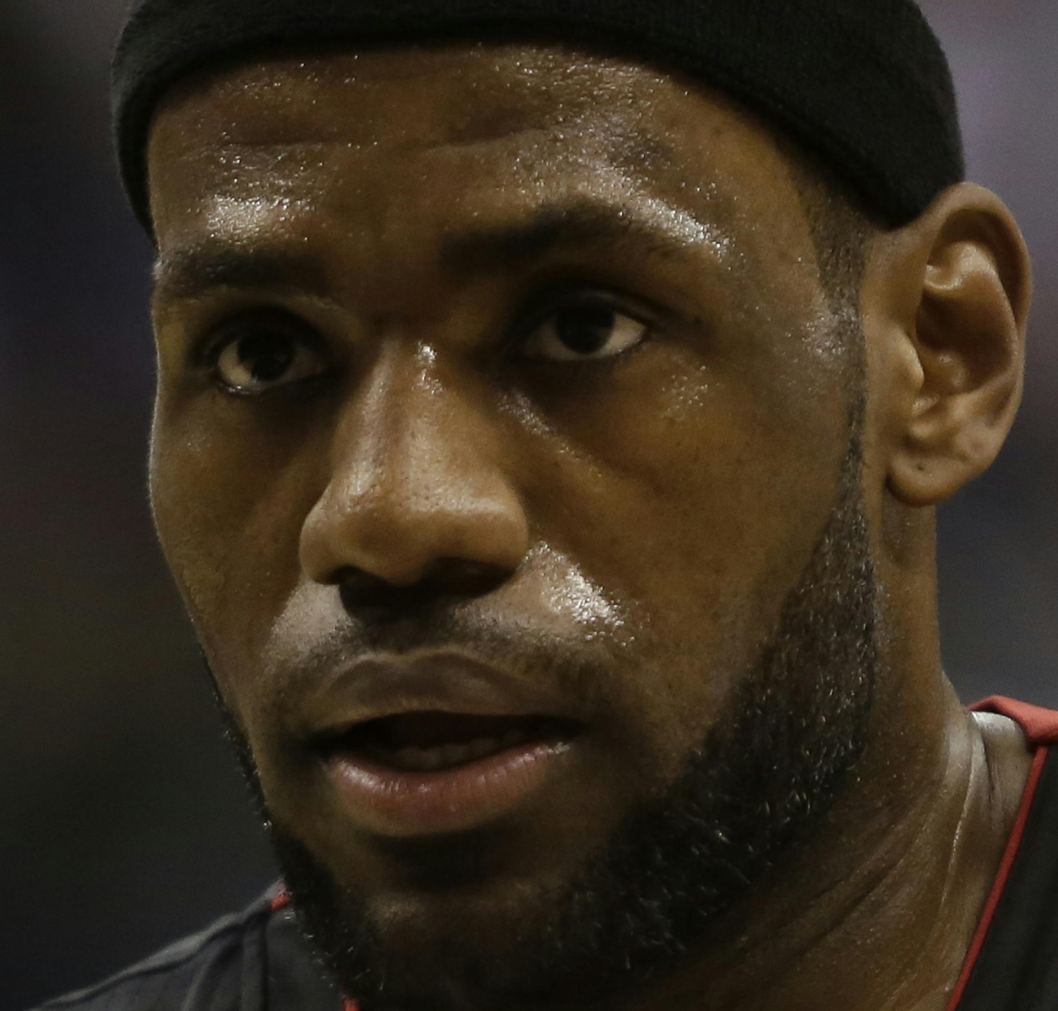 Miami Heat forward LeBron James (6) in action as the Indiana Pacers played the Miami Heat in an NBA basketball game in Indianapolis, Wednesday, March 26, 2014. The Pacers won 84-83. (AP Photo/AJ Mast)
