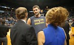 Cavaliers Kevin Love chatted with Timberwolves owner Glen Taylor and wife Becky Mulvihill in 2015.