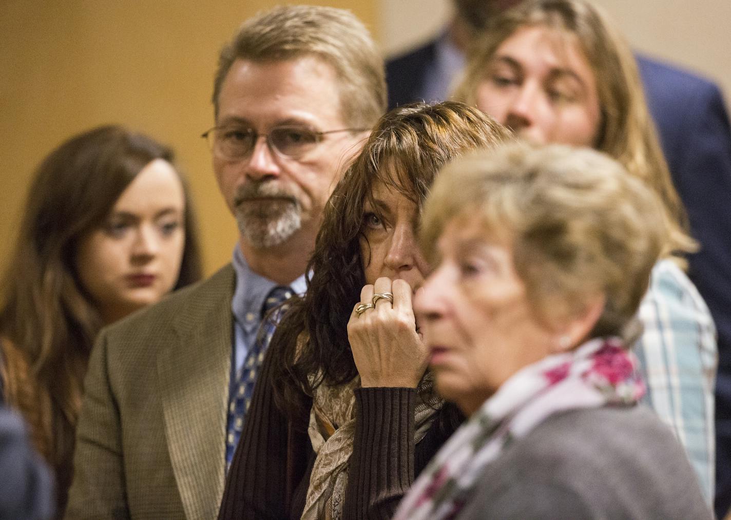 Lavonne Acre, center, and Travis Kendall, left, the parents of Levi Acre-Kendall attend their son's murder trial in Polk County Circuit Court in Balsam Lake on Friday, December 11, 2015. ] (Leila Navidi/Star Tribune) leila.navidi@startribune.com BACKGROUND INFORMATION: The murder trial of Levi Acre-Kendall, a Minnesota man charged with killing Wisconsin resident Peter S. Kelly after a dispute along the St. Croix River.