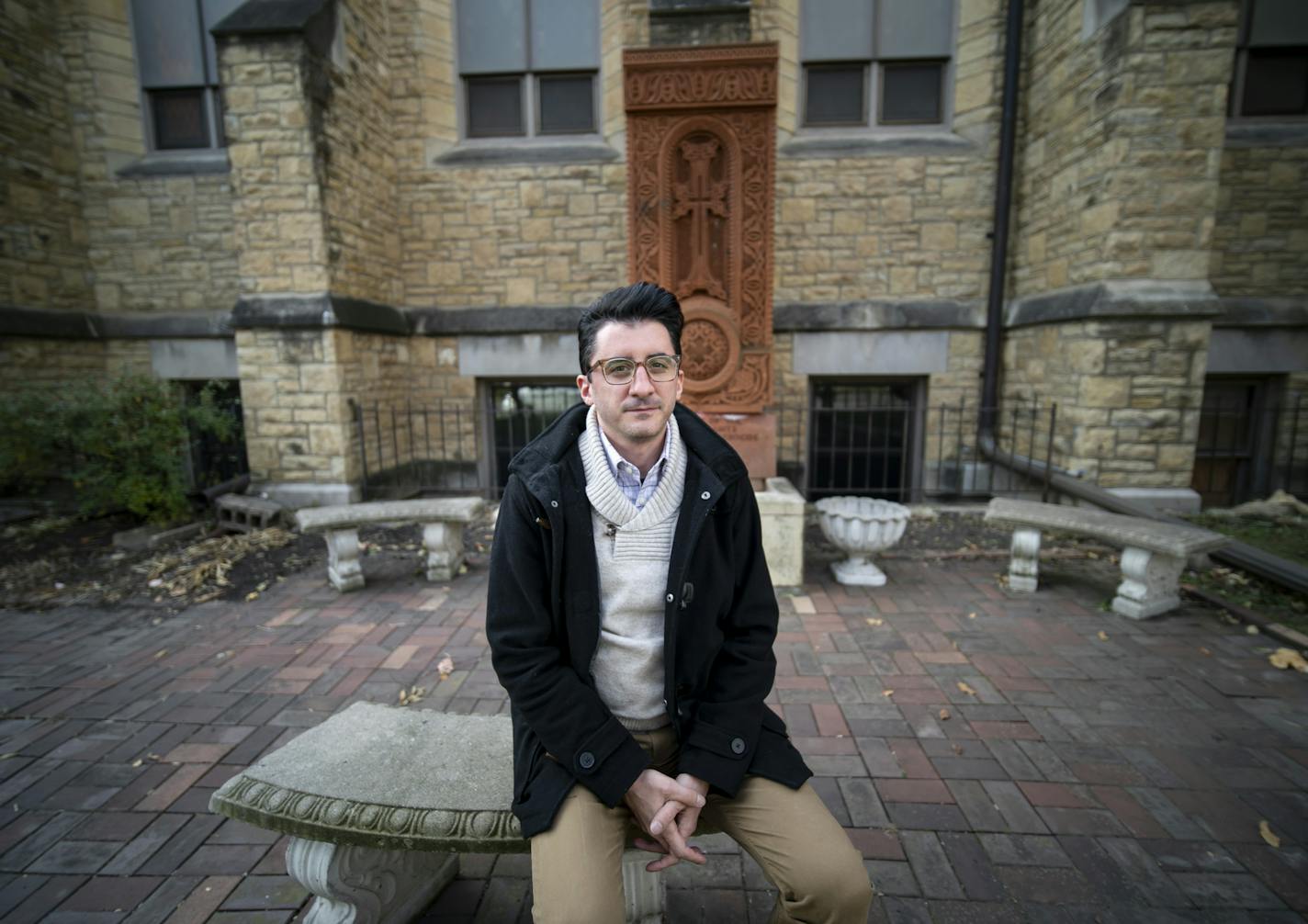 John Parker-Der Boghossian, Vice-President of the Armenian Cultural Organization of Minnesota, was shocked and upset when he heard his representative Rep. Ilhan Omar voted only "present" on the Armenian genocide resolution. He posed for a photograph in front of the St. Sahag Armenian Church's memorial to the Armenian genocide in St. Paul, Minn., on Wednesday, October 30, 2019. ] RENEE JONES SCHNEIDER &#x2022; renee.jones@startribune.com