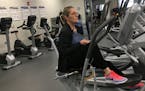 Connie Weizel of Mound works out on an elliptical bike at the new Westonka Activity Center.