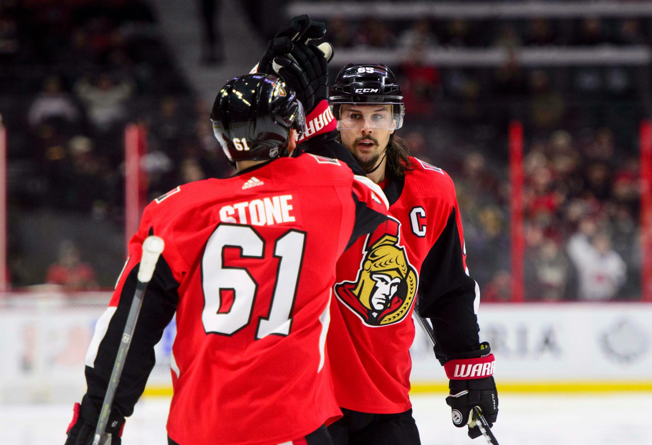 Ottawa Senators' Erik Karlsson celebrates a goal with teammate Mark Stone as they take on the Minnesota Wild during second period NHL hockey action in Ottawa on Tuesday, Dec. 19, 2017. (Sean Kilpatrick/The Canadian Press via AP)