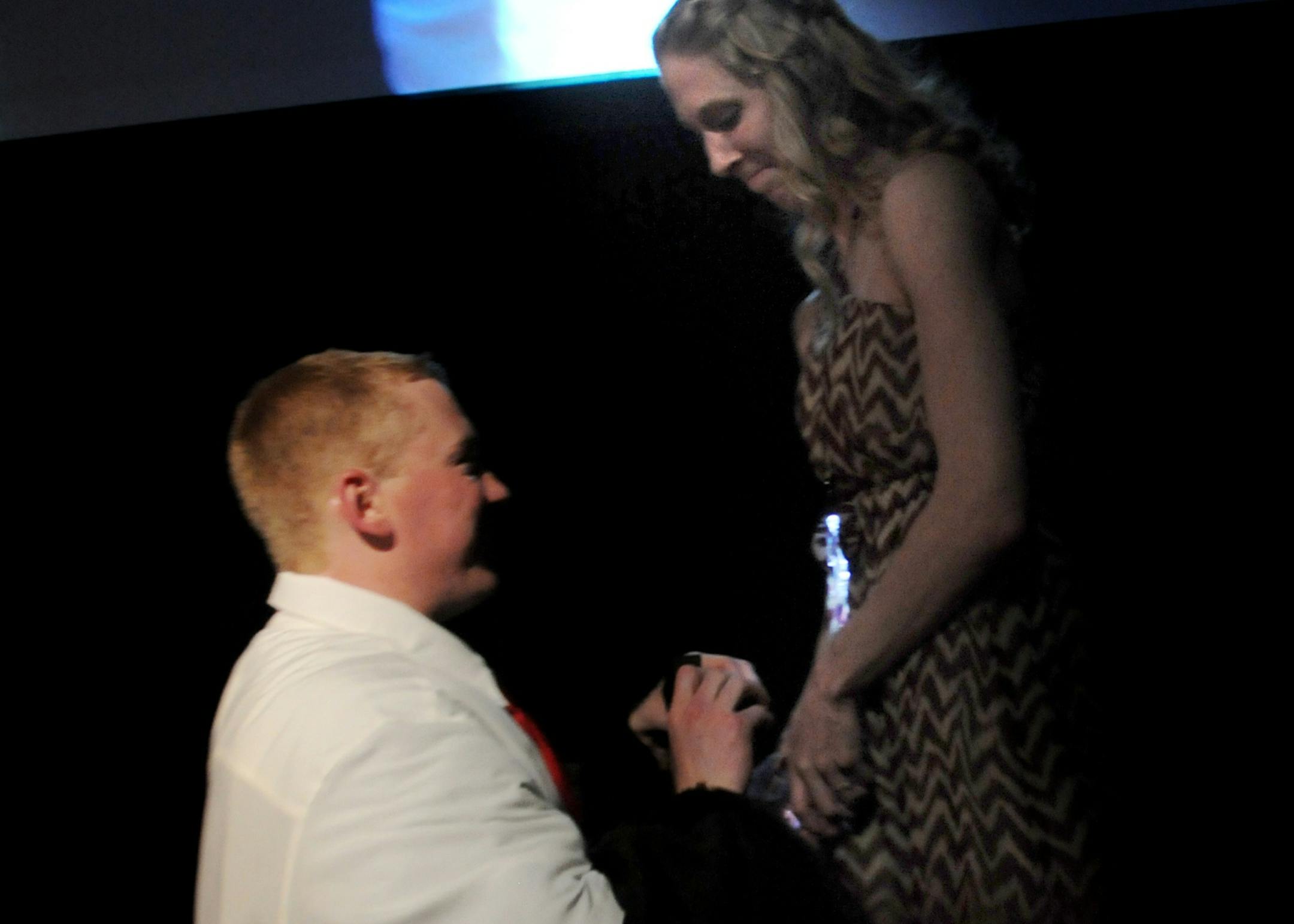 Rick Wolke, an Augsburg men's track and field alum dressed in the Auggie Eagle mascot costume to propose to Augsburg women's track and field athlete Ashley Carney on Monday. /Photo by Stephen Geffre, Augsburg College
