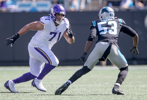 Vikings offensive tackle Christian Darrisaw (71) in action during the first quarter, Sunday, October 17, 2021 in Charlotte, NC. ] ELIZABETH FLORES •