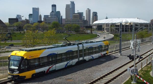 The Hiawatha light-rail line with the Minneapolis skyline in the background.