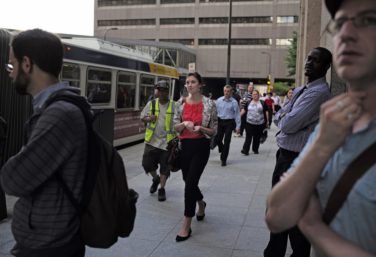 On 6th St. near 2nd Ave in downtown Minneapolis, there is no formal shelter for the busy bus stop .] rtsong-taatarii@startribune.com