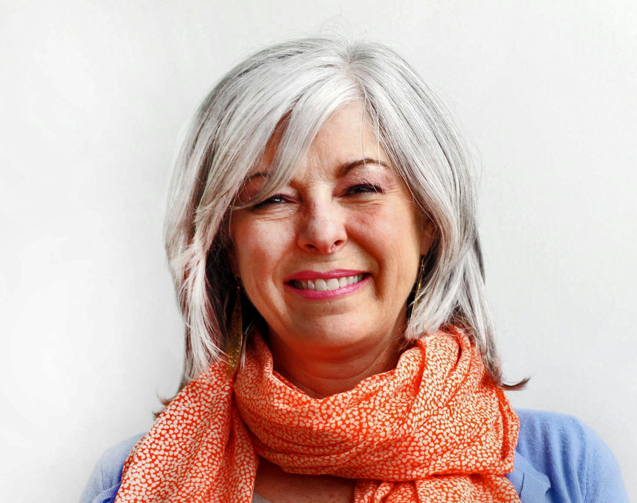 Karen London posed for a portrait before her hair was transformed. ] NICOLA LOSIK*