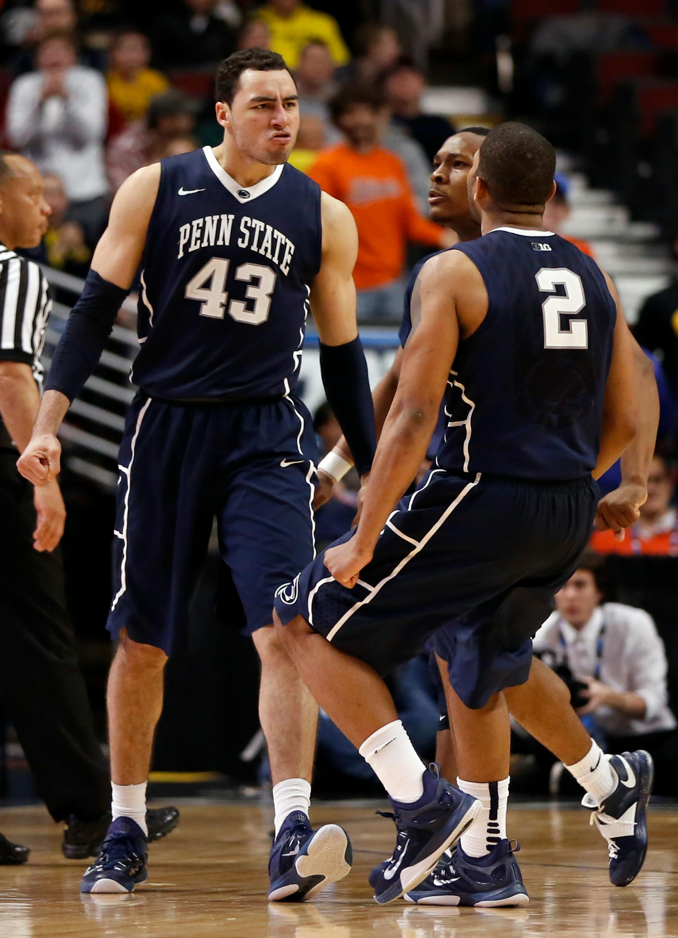 Penn State's Ross Travis (43) celebrates with his teammates after being fouled in the second half of an NCAA college basketball game against Iowa in the second round of the Big Ten Conference tournament, Thursday, March 12, 2015, in Chicago. Penn State won 67-58. (AP Photo/Charles Rex Arbogast)