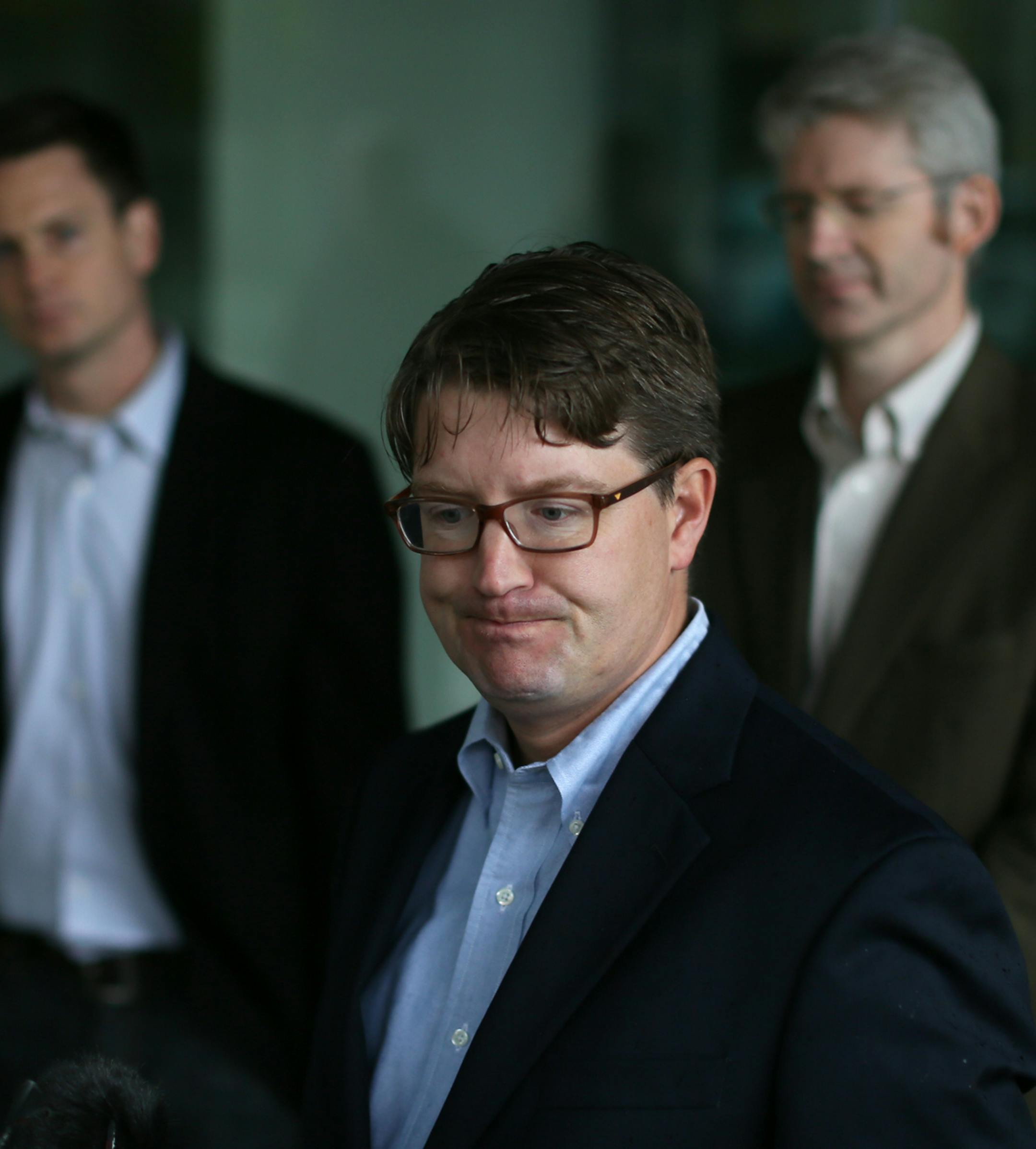 Spokesman Blois Olson said Minnesota Orchestra musicians voted unanimously Saturday, 60-0, against an offer from management. Behind Olson, from left, are musician/negotiators Doug Wright, Kevin Watkins and Marcia Peck.